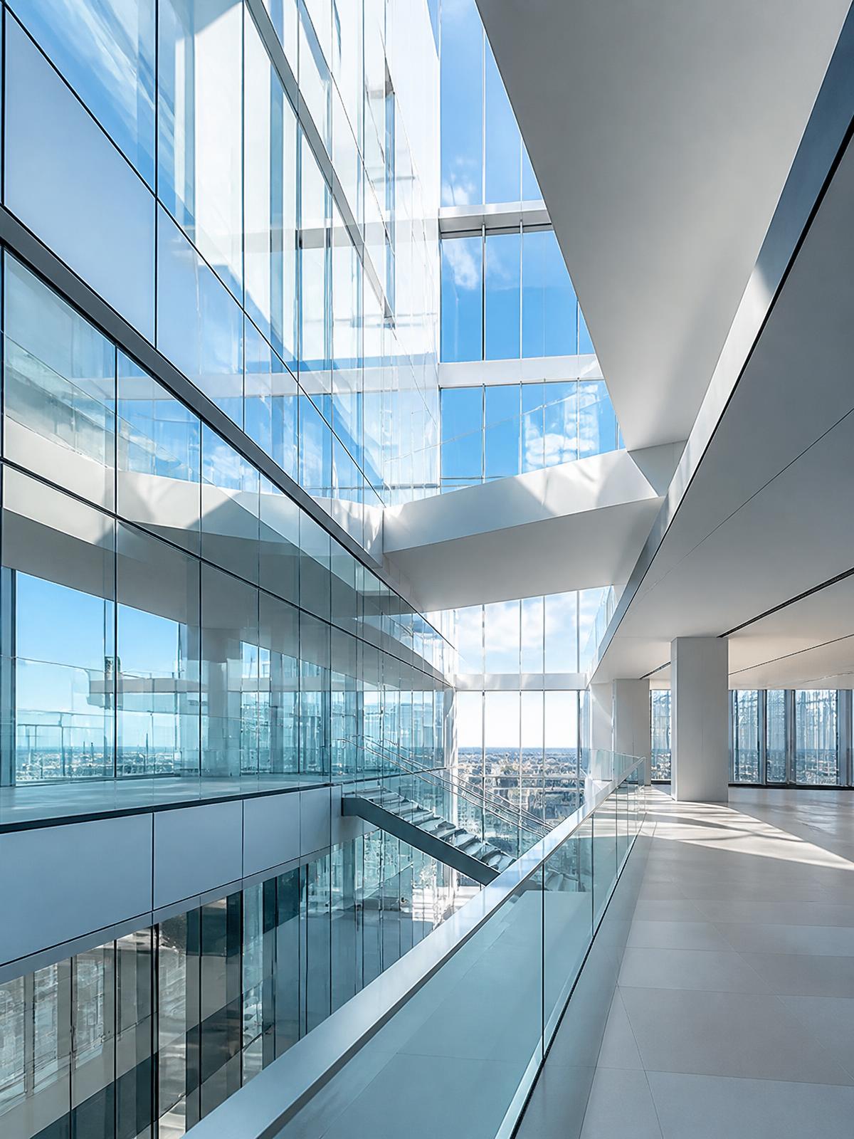 Modern glass office atrium representing forward-thinking business consulting